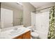 Clean bathroom with a tub, shower, and updated vanity at 6227 Legend Falls St, North Las Vegas, NV 89081