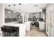 Modern kitchen with gray cabinets and white marble countertops at 6227 Legend Falls St, North Las Vegas, NV 89081