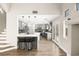 Modern kitchen with gray cabinets, white countertops, and breakfast bar at 6227 Legend Falls St, North Las Vegas, NV 89081