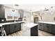 Open concept kitchen with gray cabinets, white countertops, and large island at 6227 Legend Falls St, North Las Vegas, NV 89081