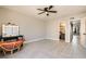 Bedroom with tile floors, a ceiling fan, and a vanity area at 6381 W Washington Ave, Las Vegas, NV 89107