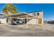 Carport parking area with a view of the building at 6381 W Washington Ave, Las Vegas, NV 89107