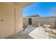 Private patio with small table and chairs at 6381 W Washington Ave, Las Vegas, NV 89107