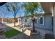 Landscaped backyard with pergola and stone pathway at 6725 Carrera Dr, Las Vegas, NV 89103