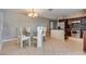 Kitchen dining area with glass table and modern chairs at 6725 Carrera Dr, Las Vegas, NV 89103