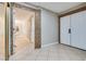 Bright entryway with tile flooring, granite accents, and double doors at 6725 Carrera Dr, Las Vegas, NV 89103