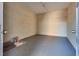 Empty storage room with concrete floor and cinderblock walls at 6725 Carrera Dr, Las Vegas, NV 89103