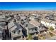 Aerial view of houses with solar panels in a community at 707 Cottonwood Hill Pl, Henderson, NV 89011