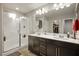 Modern bathroom with double vanity and shower at 707 Cottonwood Hill Pl, Henderson, NV 89011