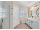 Double vanity bathroom with shower and tile floors at 7132 Junction Village Ave, Las Vegas, NV 89129