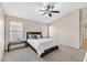 Bright bedroom with a ceiling fan and ample natural light at 7132 Junction Village Ave, Las Vegas, NV 89129