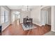 Dining area with hardwood floors and a stylish chandelier at 7132 Junction Village Ave, Las Vegas, NV 89129