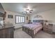 Main bedroom with ceiling fan and stylish dresser at 7163 Brassica Ct, Las Vegas, NV 89148