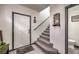 Bright entryway with staircase and half bathroom at 7163 Brassica Ct, Las Vegas, NV 89148