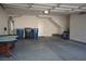 Garage with interior access, storage, and game table at 7163 Brassica Ct, Las Vegas, NV 89148