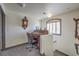 Charming home office with vintage roll top desk at 7163 Brassica Ct, Las Vegas, NV 89148