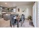 Modern kitchen featuring gray cabinets, stainless steel appliances, and an island at 7163 Brassica Ct, Las Vegas, NV 89148