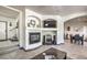 Living room with fireplace and built-in entertainment center at 7163 Brassica Ct, Las Vegas, NV 89148