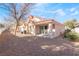 Landscaped backyard with gravel and a tree at 7925 Settlers Ridge Ln, Las Vegas, NV 89145