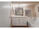 Clean bathroom, featuring a bathtub and updated vanity at 7925 Settlers Ridge Ln, Las Vegas, NV 89145