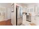 Modern kitchen with stainless steel appliances and white cabinetry at 7925 Settlers Ridge Ln, Las Vegas, NV 89145