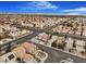 Aerial view of a residential neighborhood with houses and streets at 8101 Spur Ct, Las Vegas, NV 89145