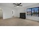 Bright bedroom with fireplace and view to backyard at 8101 Spur Ct, Las Vegas, NV 89145