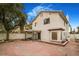 House exterior showcasing a two story home with backyard patio at 8101 Spur Ct, Las Vegas, NV 89145