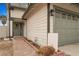 House exterior with green garage door and walkway at 8101 Spur Ct, Las Vegas, NV 89145