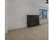 Living room with fireplace and carpet flooring at 8101 Spur Ct, Las Vegas, NV 89145