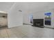 Living room with a fireplace and tiled floor at 8101 Spur Ct, Las Vegas, NV 89145