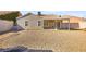 Backyard view showing house, patio, and shed at 861 Zinnia Cir, Henderson, NV 89015