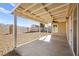 Covered patio, gravel yard, storage shed, and ceiling fan at 861 Zinnia Cir, Henderson, NV 89015