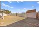 Large backyard with two sheds and patio at 861 Zinnia Cir, Henderson, NV 89015