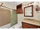 Bathroom with vanity, large mirror, and shower/tub combo at 861 Zinnia Cir, Henderson, NV 89015