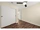 Bedroom featuring a ceiling fan and sliding door closet at 861 Zinnia Cir, Henderson, NV 89015