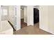 Hallway with laundry closet and bedroom access at 861 Zinnia Cir, Henderson, NV 89015