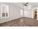 Spacious living room with wood-look floors and ceiling fan at 861 Zinnia Cir, Henderson, NV 89015