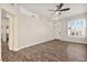 Living room with wood-look floors and ceiling fan at 861 Zinnia Cir, Henderson, NV 89015