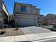 Two-story home with gray exterior and attached garage at 8976 Sweet Chestnut Ln, Las Vegas, NV 89178