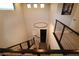 View of a two-story home's interior staircase with modern railings at 8976 Sweet Chestnut Ln, Las Vegas, NV 89178