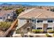 Exterior view of two story building with tile roof at 9303 Gilcrease Ave # 2177, Las Vegas, NV 89149