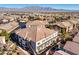 Aerial view showcasing building and distant mountains at 9303 Gilcrease Ave # 2177, Las Vegas, NV 89149