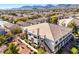 Aerial view of building with mountain backdrop at 9303 Gilcrease Ave # 2177, Las Vegas, NV 89149