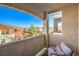 Private balcony offering scenic views and seating area at 9303 Gilcrease Ave # 2177, Las Vegas, NV 89149