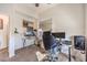 Bright home office features a large desk and comfortable chair at 9303 Gilcrease Ave # 2177, Las Vegas, NV 89149