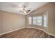 Bright bedroom featuring bay window and ceiling fan at 9612 World Cup Dr, Las Vegas, NV 89117