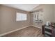 Bedroom with wood-look floors and a closet at 9612 World Cup Dr, Las Vegas, NV 89117