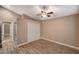 Bedroom with ceiling fan and double-door closet at 9612 World Cup Dr, Las Vegas, NV 89117