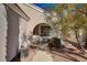 Front entry with arched doorway and walkway at 9612 World Cup Dr, Las Vegas, NV 89117